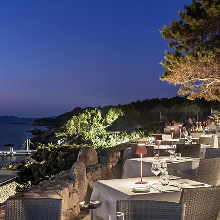 Hotel La Rocca Resort & Spa Baja Sardinia Exterior photo